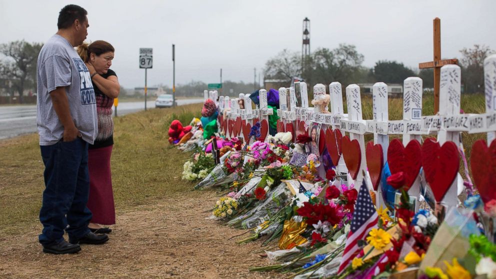 PHOTO: People visit the makeshift memorial near the First Baptist Church in Sutherland Springs, Texas, Nov. 12, 2017, honoring the 25 people including a pregnant woman whose unborn baby also died on Nov. 5, 2017. 