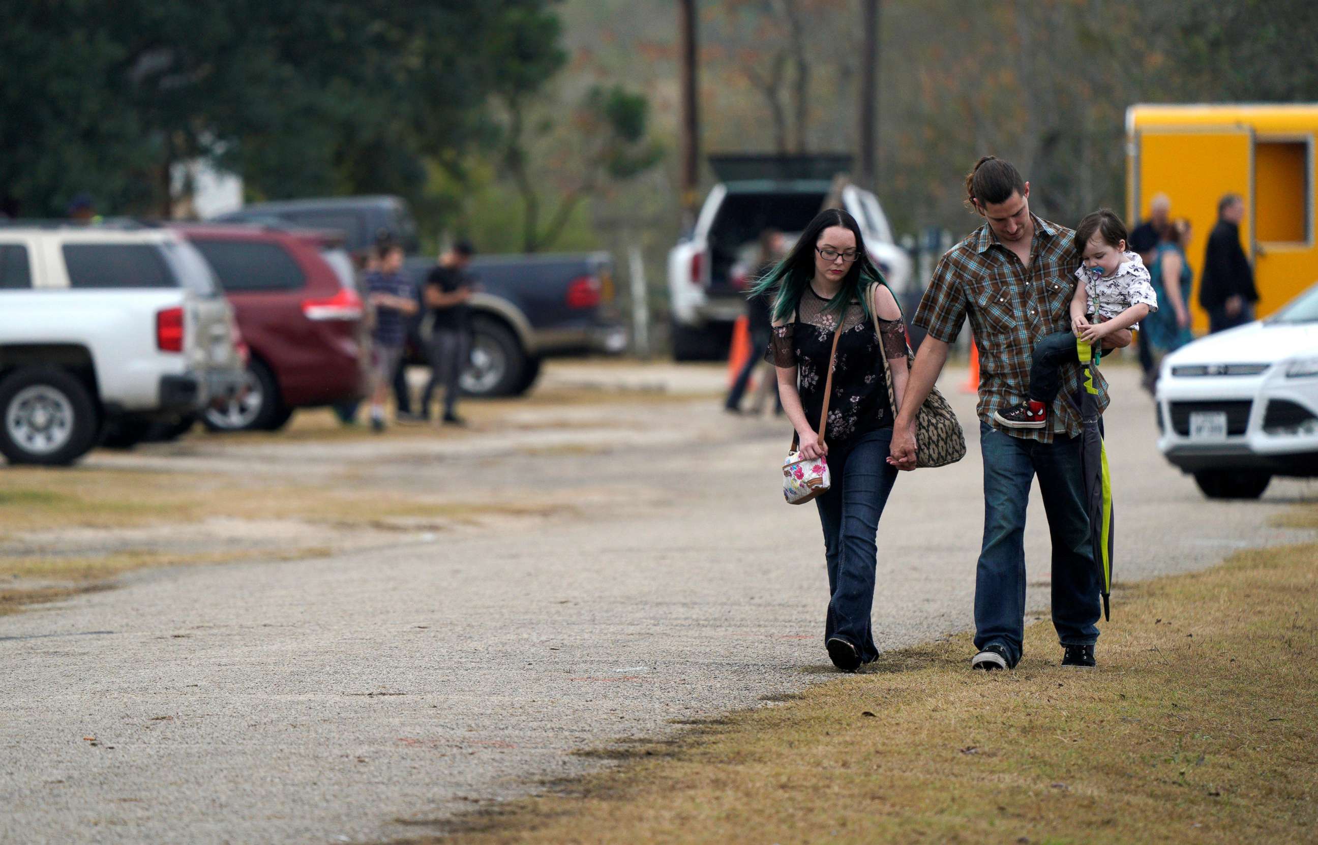 PHOTO: A family leaves the First Baptist Church of Sutherland Springs worship service, the first service since a gunman opened fire inside the small church a week earlier in Sutherland Springs, Texas, Nov. 12, 2017. 