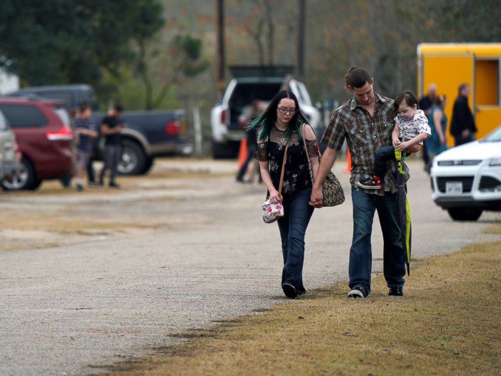 PHOTO: A family leaves the First Baptist Church of Sutherland Springs worship service, the first service since a gunman opened fire inside the small church a week earlier in Sutherland Springs, Texas, Nov. 12, 2017.