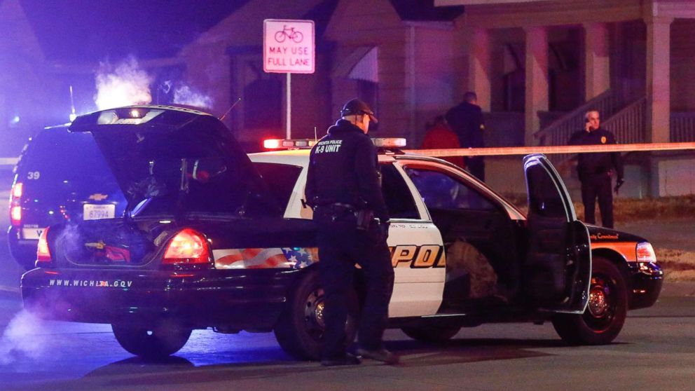 Wichita police investigate a call of a possible hostage situation near the corner of McCormick and Seneca in Wichita, Kan., on the night of Dec. 28, 2017.