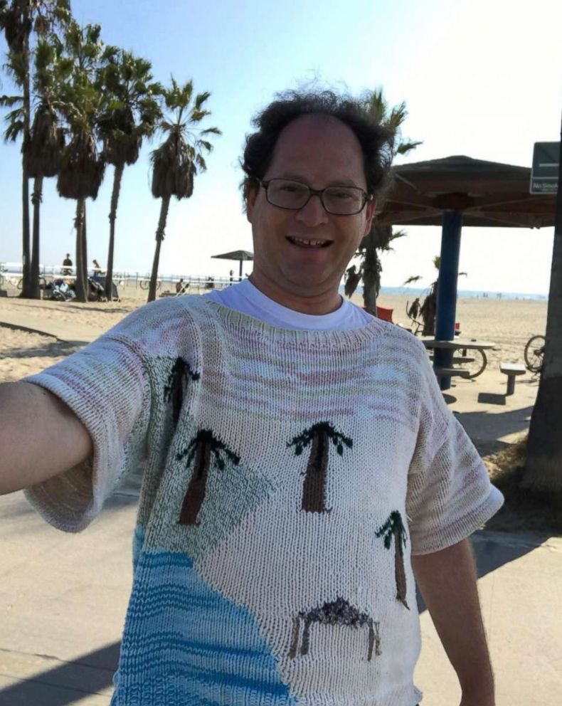 PHOTO: Sam Barsky knits sweaters of famous places and landmarks, and takes pictures there while in his matching sweater.