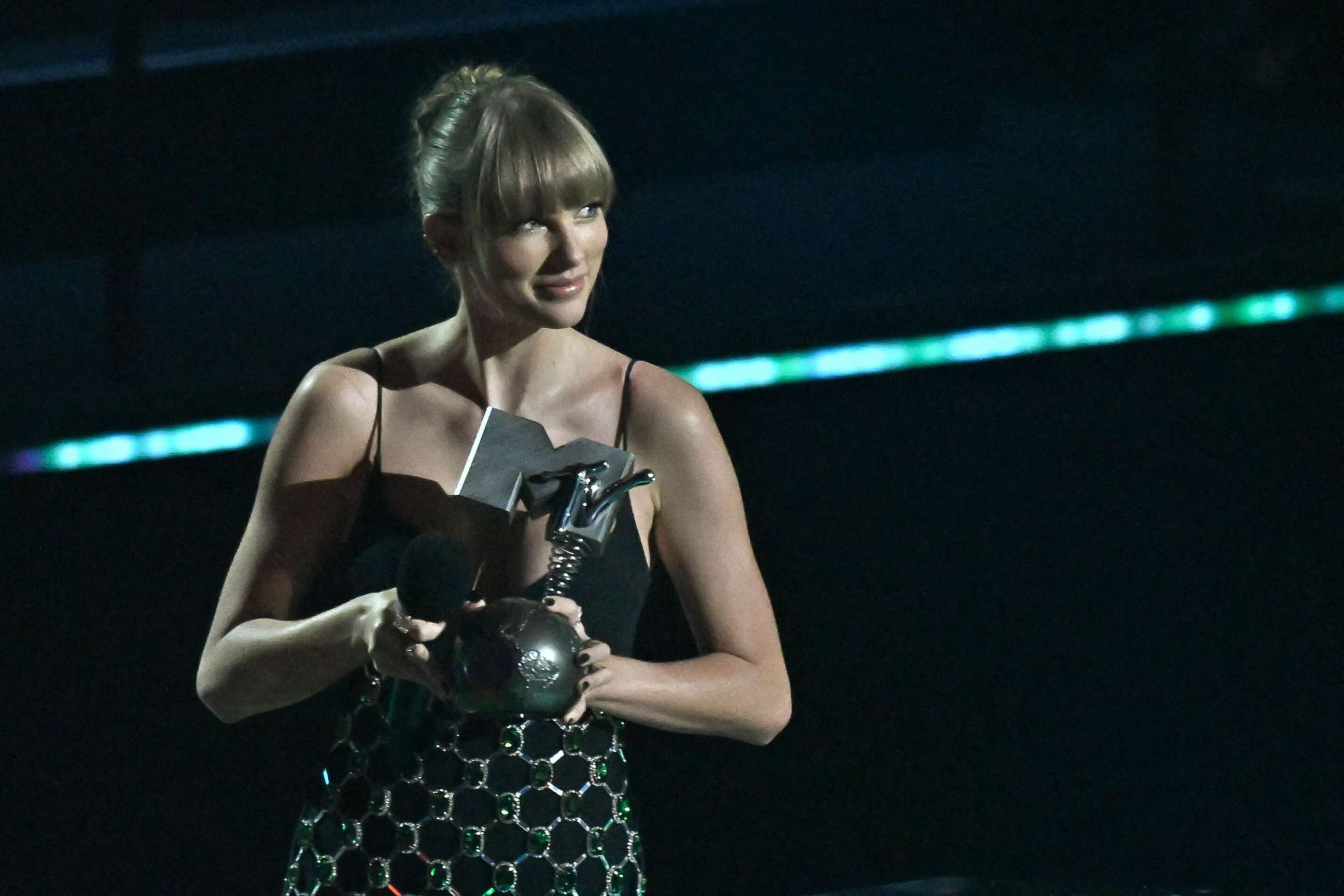 PHOTO: US singer-songwriter Taylor Swift poses with the award for "Best Longform Video" during the 2022 MTV Europe Music Awards in Düsseldorf, Germany, Nov. 13, 2022. 