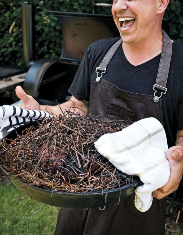 PHOTO: Chef Michael Symon is photographed here in a shot from his new cookbook, "Michael Symon's Playing With Fire." 