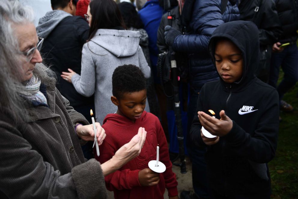 PHOTO: People arrive to pay their respects outside of the Tree of Life synagogue, Oct. 28, 2018, in Pittsburgh on October 27, 2018. 