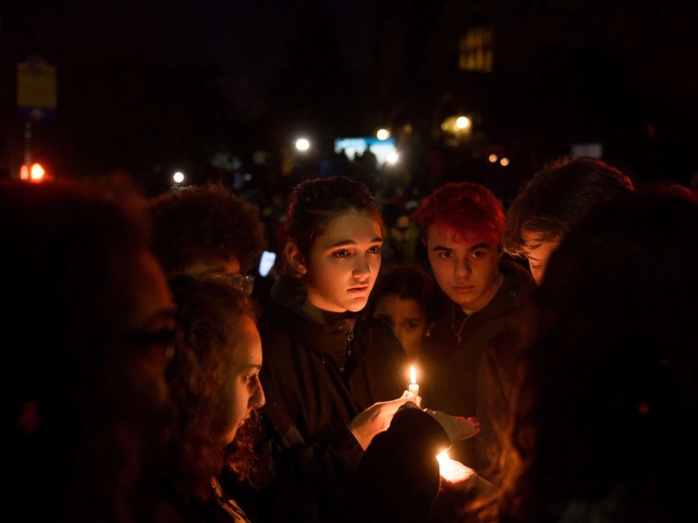 PHOTO: People gather for a interfaith candlelight vigil a few blocks away from the site of a mass shooting at the Tree of Life Synagogue, Oct. 27, 2018, in Pittsburgh.