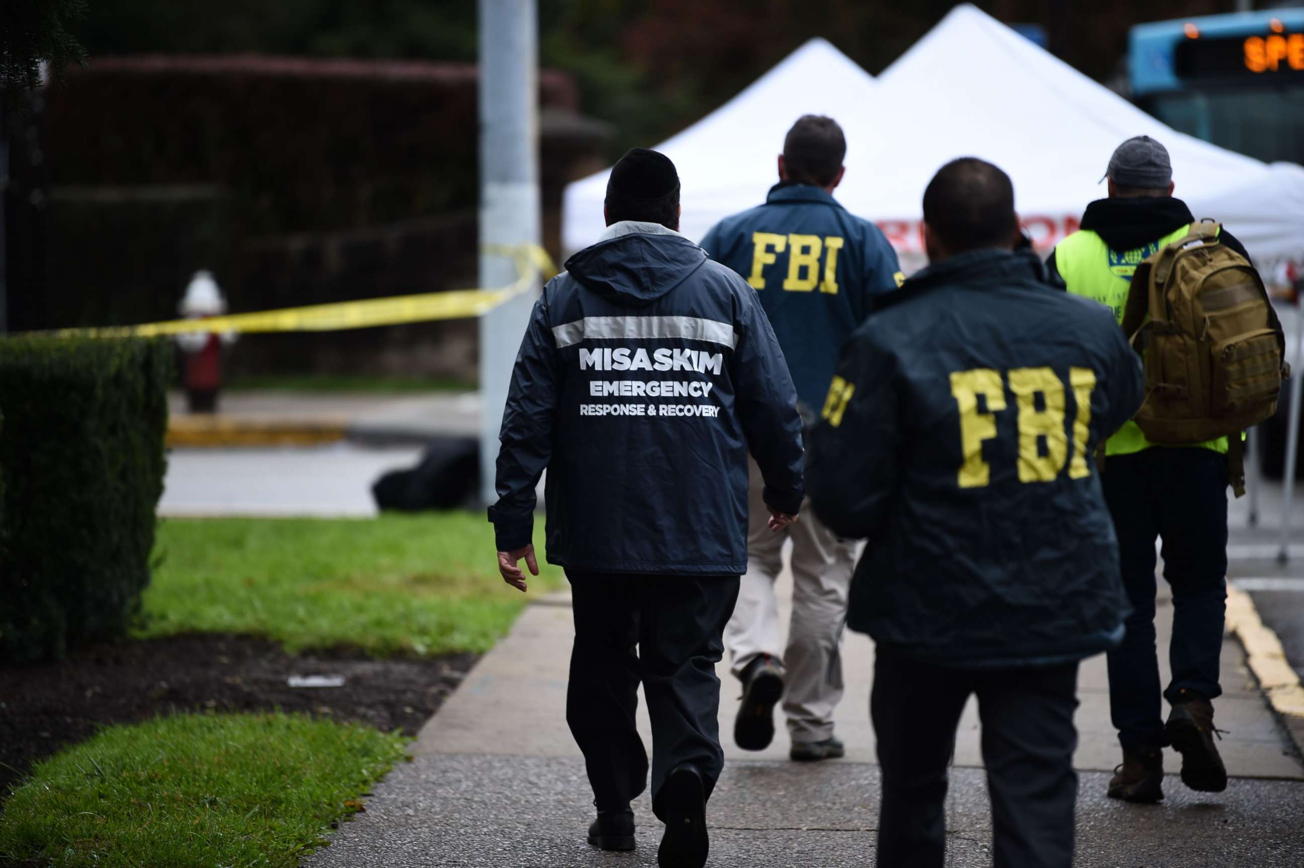 PHOTO: Members of the FBI and others survey the area, Oct. 28, 2018, outside the Tree of Life Synagogue after a fatal shooting in Pittsburgh.