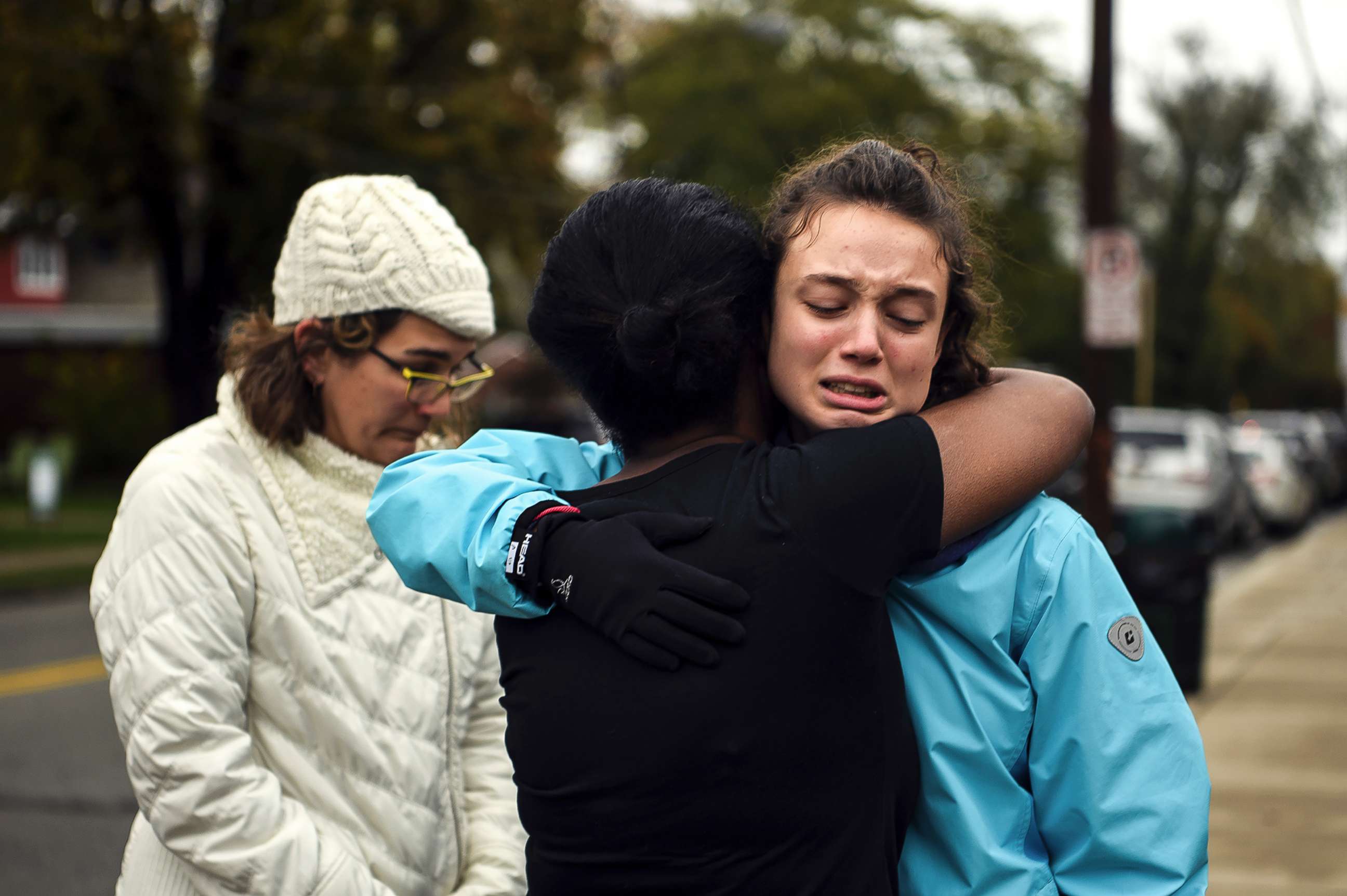 PHOTO: From left, Kate Rothstein looks on as Tammy Hepps hugs Simone Rothstein, after multiple people were shot at The Tree of Life Congregation synagogue, Oct, 27, 2018, in Pittsburgh.