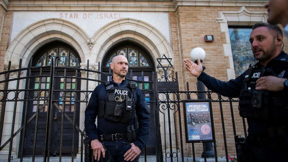 PHOTO: New Jersey police officers stand guard in front of the United Synagogue of Hoboken in New Jersey, Nov. 4, 2022.