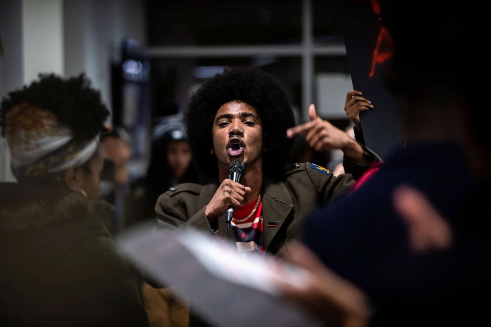 PHOTO: A student speaks during a rally against white supremacy at Syracuse University in Syracuse, N.Y., Nov. 20, 2019.