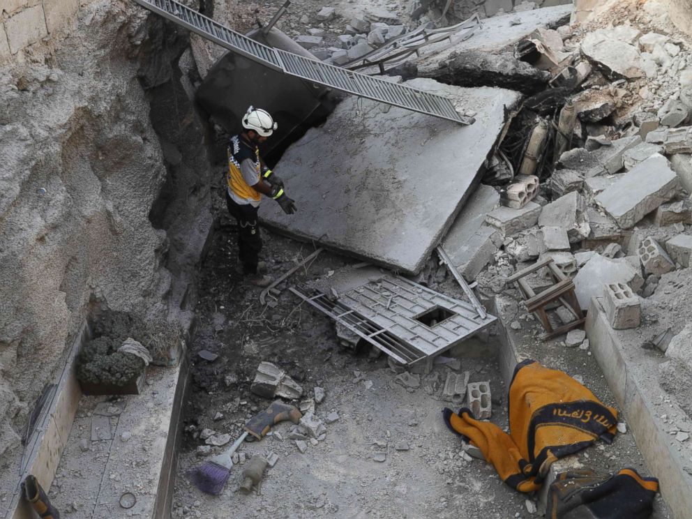 PHOTO: A member of the Syrian Civil Defence walks through the wreckage of their center which was destroyed by government forces bombardment in the town of al-Tamana on the southern edges of the rebel-held Idlib province, Sept. 6, 2018.