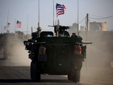 PHOTO: A convoy of US forces drive near the village of Yalanli, on the western outskirts of the northern Syrian city of Manbij, March 5, 2017.