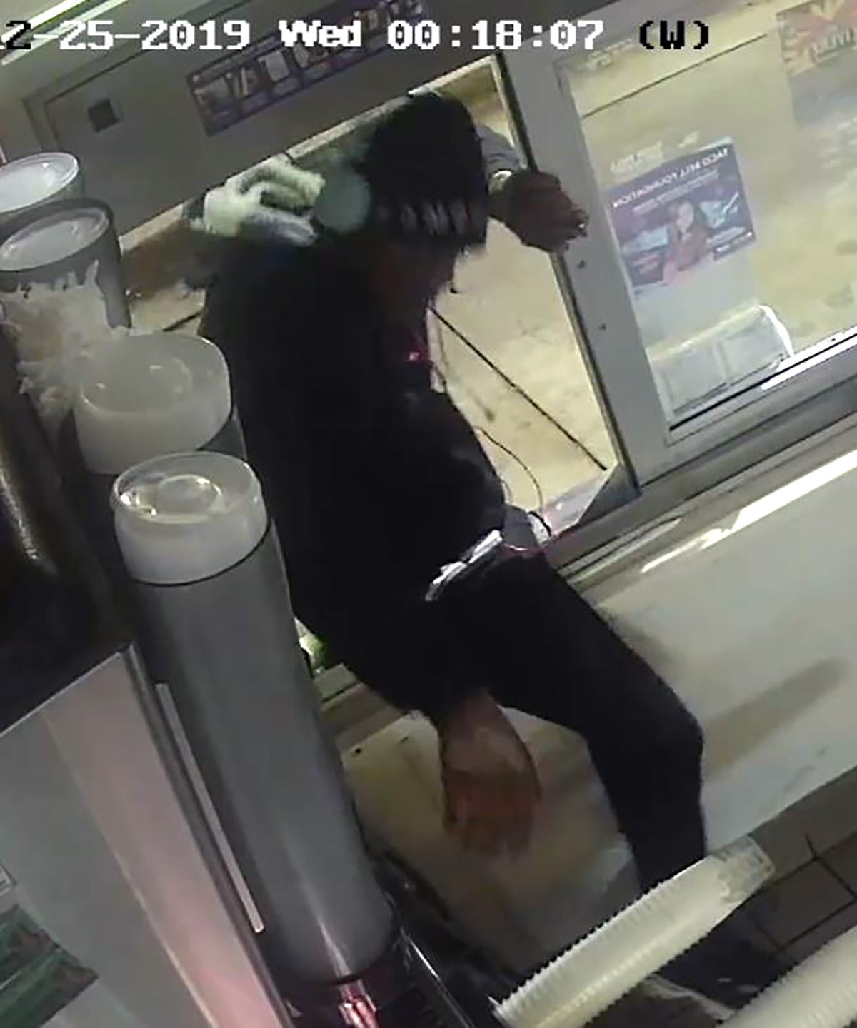 PHOTO: A man entered through a drive-thru window and then prepared food and napped during a burglary at a local Taco Bell in Lawrenceville, Ga., on Dec. 25, 2019.