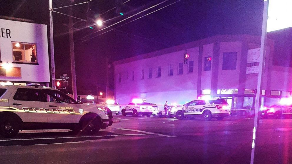 PHOTO: Police investigate the scene of an early morning shooting involving multiple people at of S. Tacoma Way between S. 56th and S. 58th streets in Tacoma, Wash., June 26, 2022.