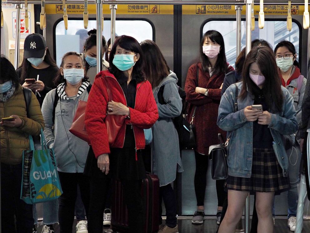 PHOTO: Passengers stand next close together inside an MRT (Mass Rapid Rransit) train car in Taipei, Taiwan, April 1, 2020.