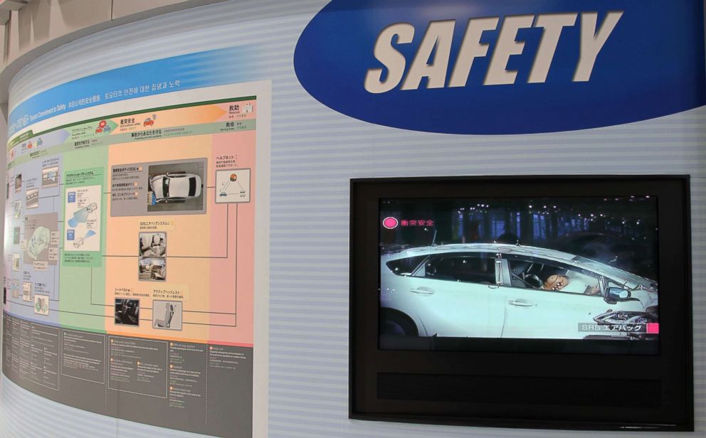 PHOTO: A screen displays a video on airbag safety on Toyota Motor Corp. vehicles at the company's showroom in Tokyo, Japan, April 11, 2013.