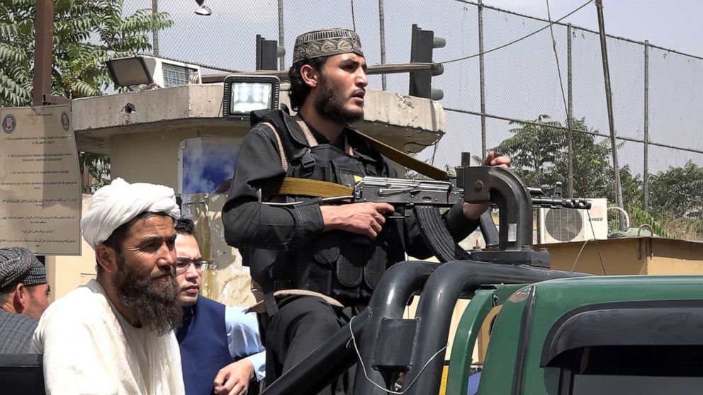 PHOTO: Taliban fighters stand guard before the Taliban spokesman Zabihullah Mujahid arrives for his first news conference in Kabul, Afghanistan, on Aug.17, 2021.