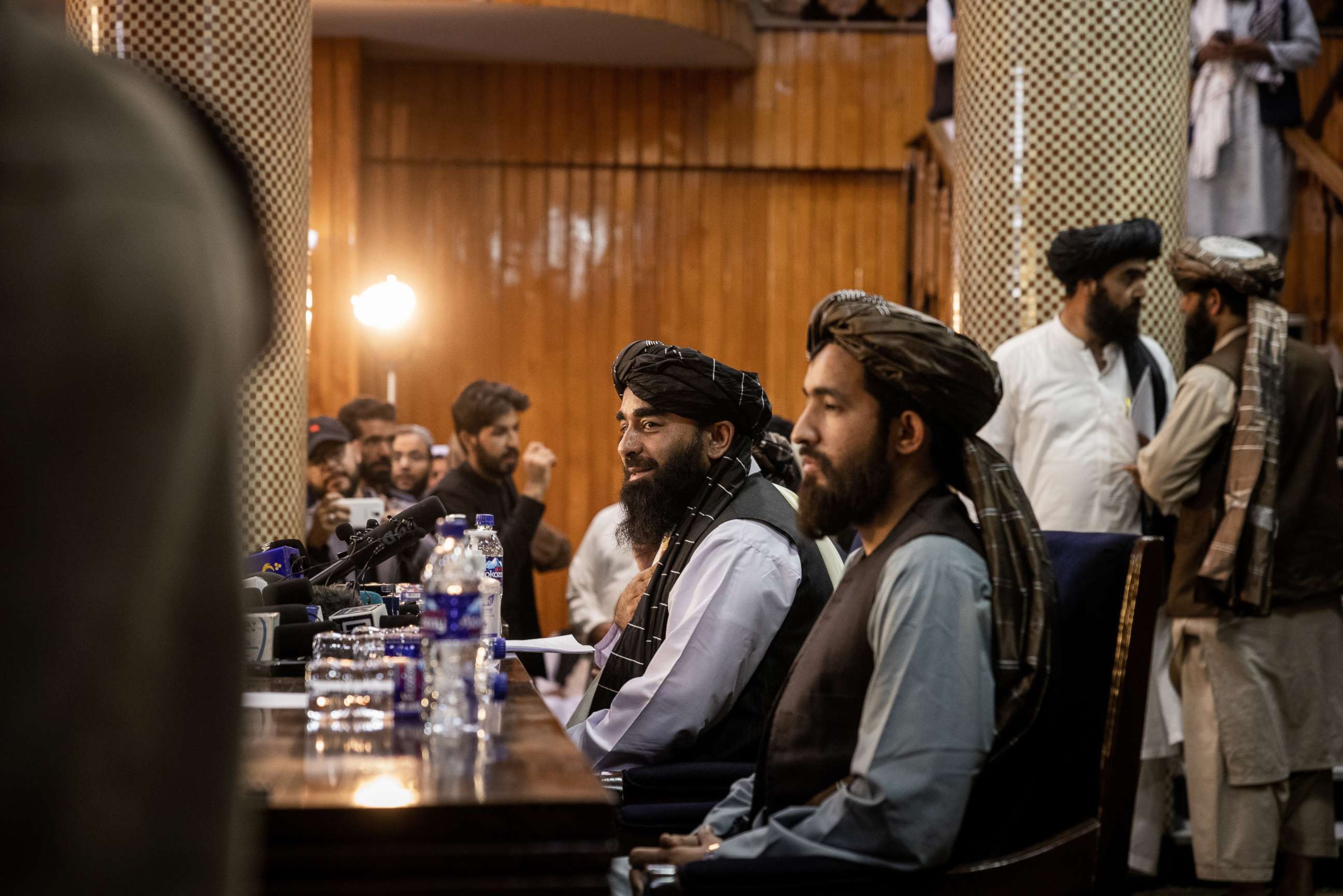 PHOTO: Zabihullah Mujahid, center, the Taliban's spokesperson, speaks to the media in Kabul, Afghanistan on Aug. 17, 2021, at their first news conference after they took control of Kabul.