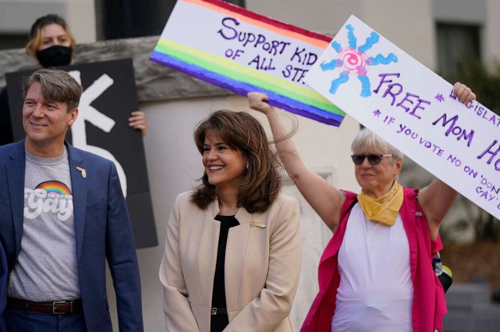 PHOTO: Florida Sen. Annette Taddeo, center, lends her support to demonstrators on the steps of the Florida Historic Capitol Museum in front of the Florida State Capitol, on March 7, 2022, in Tallahassee, Fla.