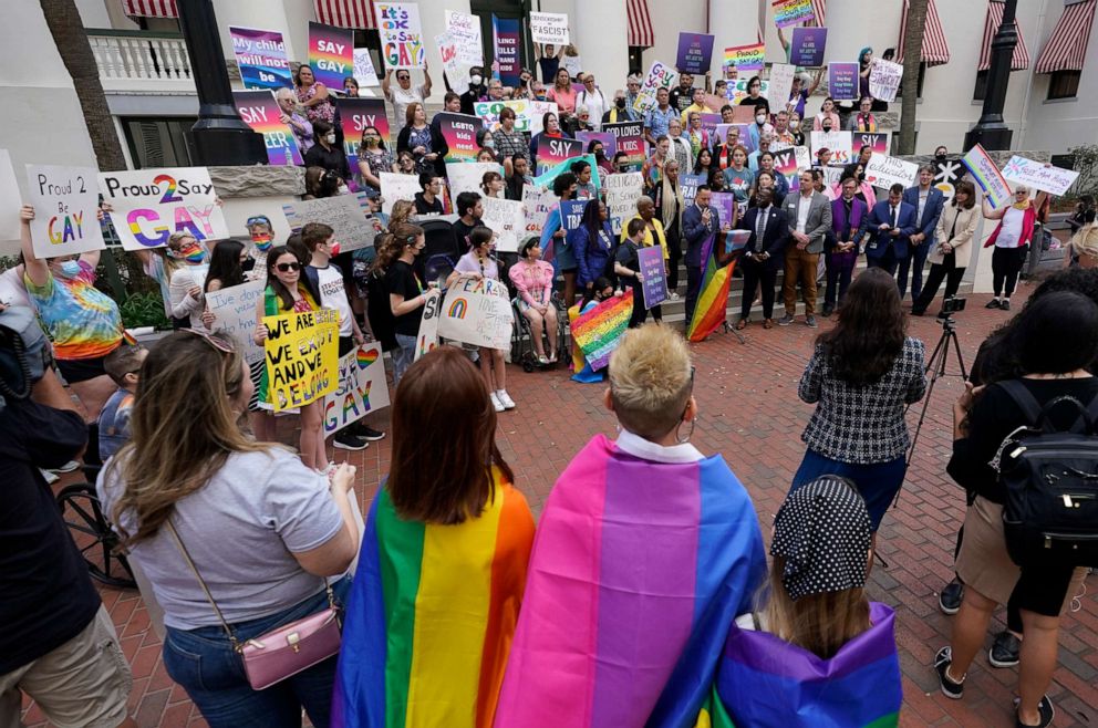 PHOTO: Demonstrators gather on the steps of the Florida Historic Capitol Museum in front of the Florida State Capitol, on March 7, 2022, in Tallahassee, Fla.