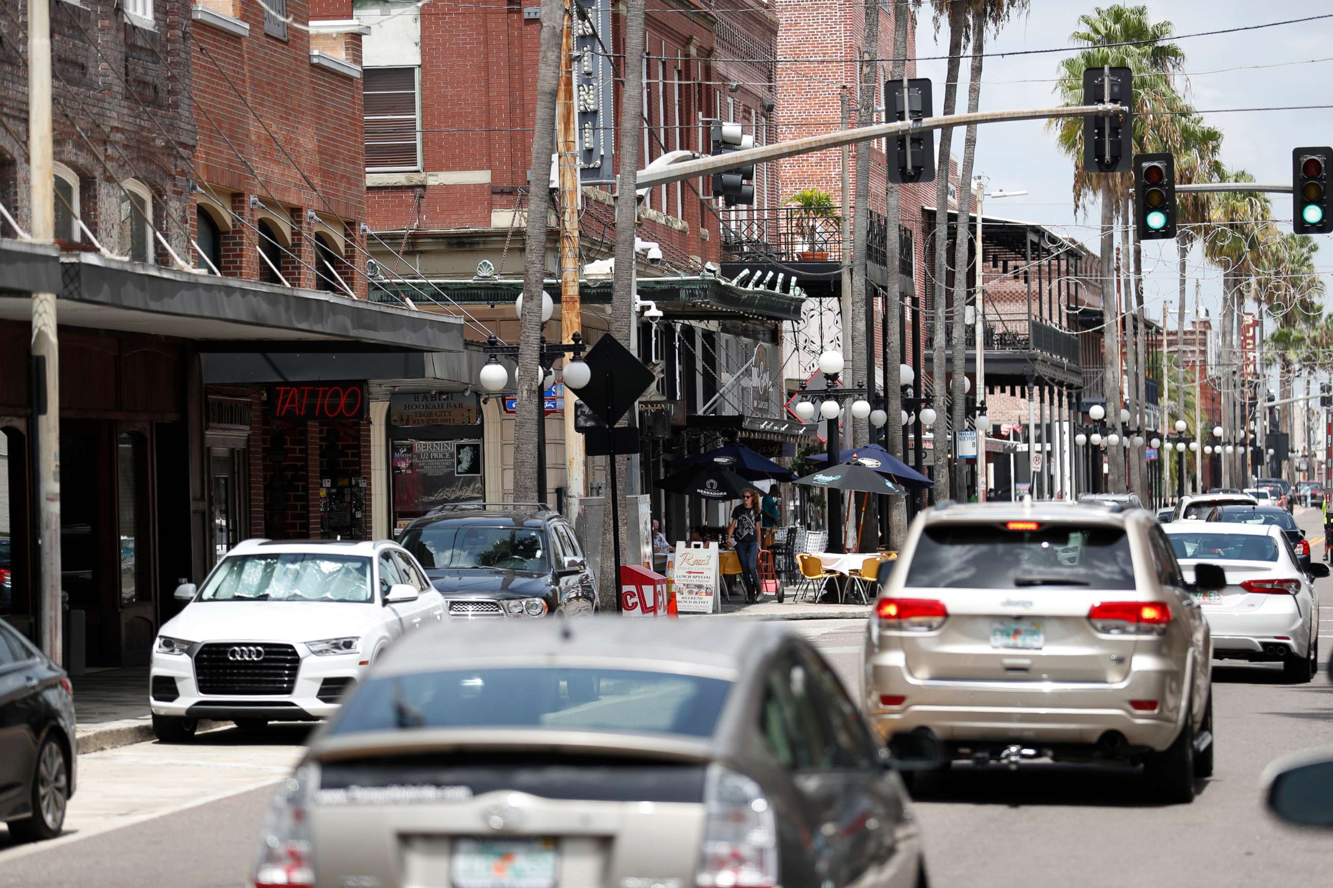 PHOTO: In this June 26, 2020, file photo, cars are seen driving on 7th Avenue in the Ybor City neighborhood of Tampa, Fla.