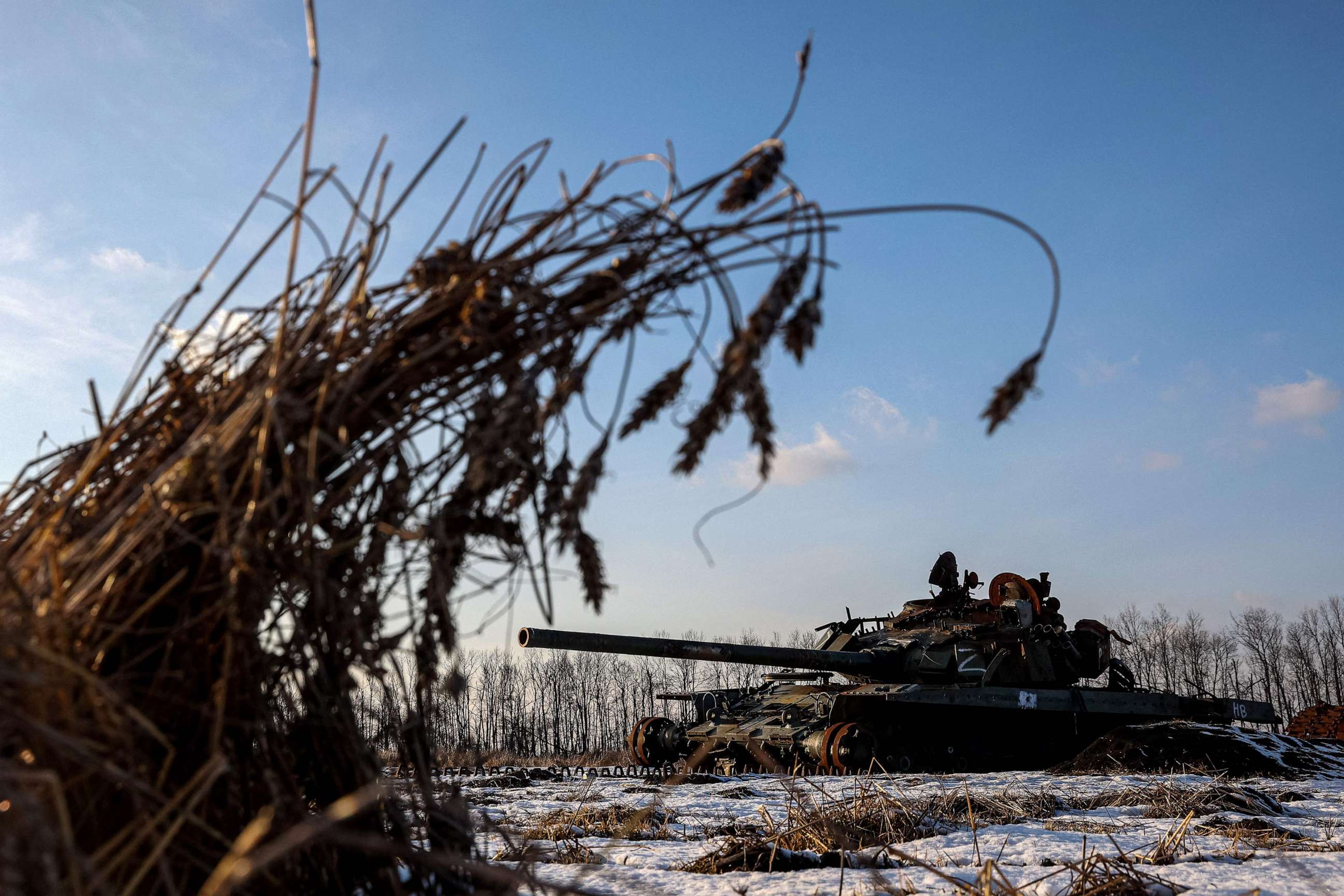 PHOTO: A destroyed Russian tank sits in a snow covered wheat field in Kharkiv region on Feb. 22, 2023, amid Russia's military invasion on Ukraine.