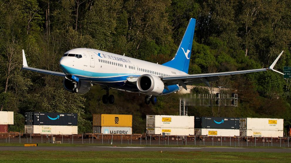 PHOTO: A Boeing 737 MAX 8, the second jet intended for use by a Chinese airline to be returned to its manufacturer, lands at Boeing Field, as trade tensions escalate over U.S. tariffs with China, in Seattle, Washington, April 22, 2025.