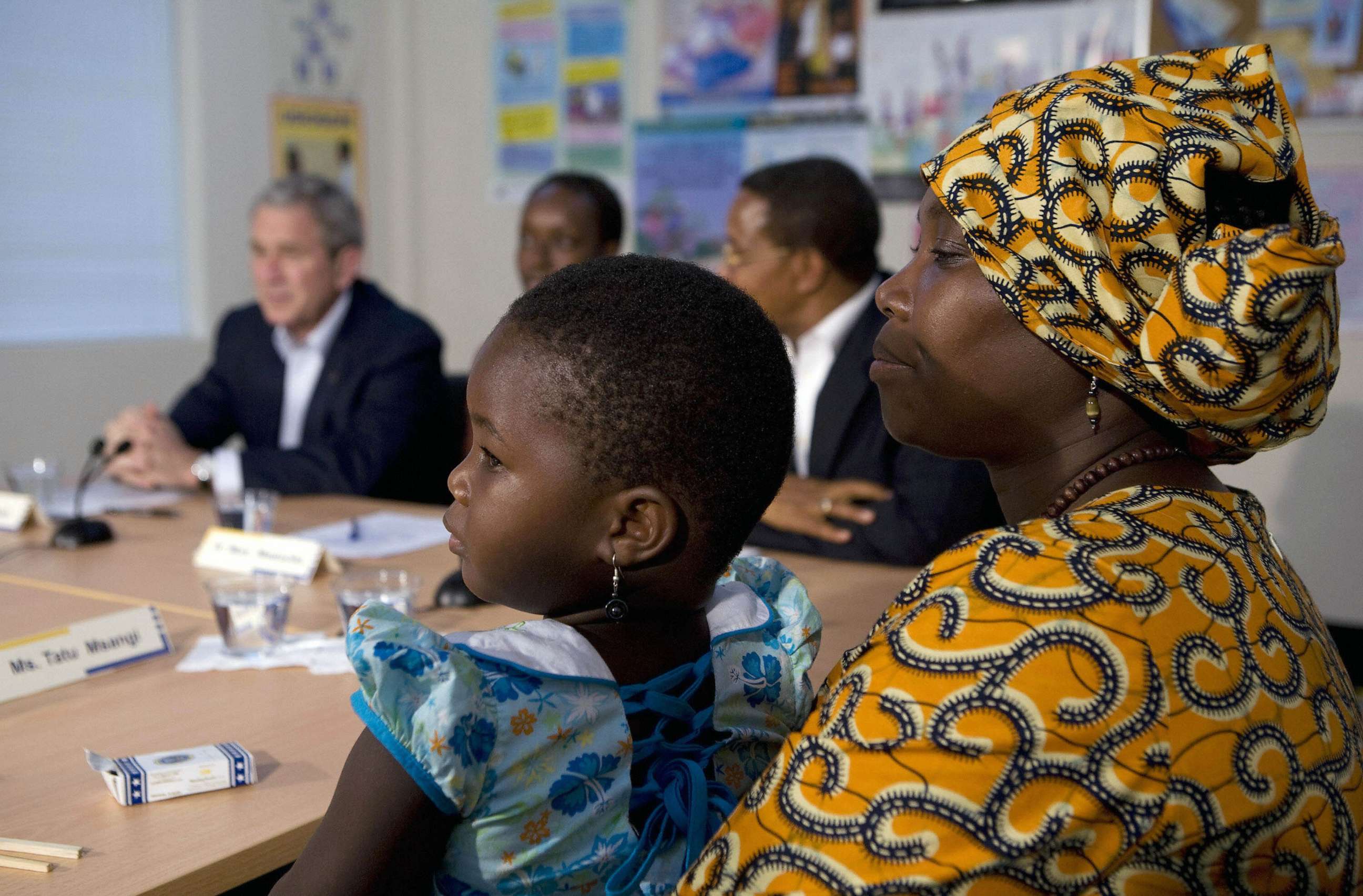 PHOTO: FILE - Tatu Msangi holds her three-year-old daughter Faith during a roundtable discussion with US President George W. Bush on the PEPFAR AIDS program at the Amana district hospital, Feb. 17, 2008 in Dar es Salaam.