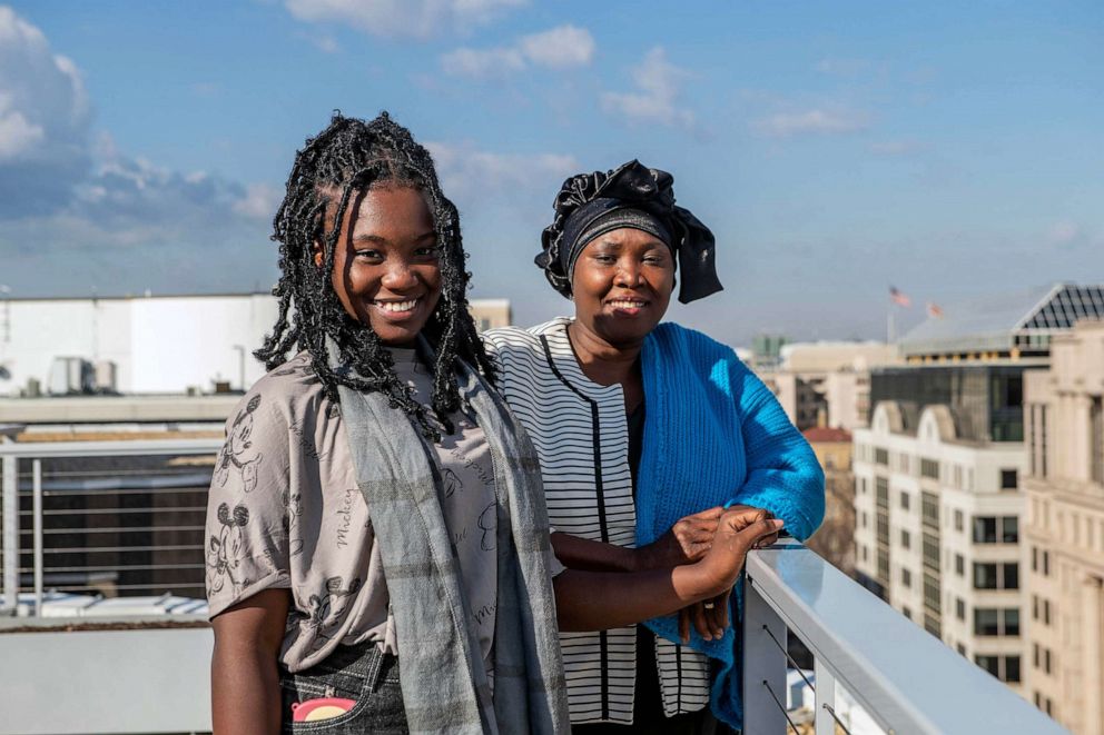 PHOTO: Tatu Msangi and her daughter Faith pose for a portrait.