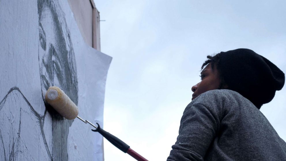 Tatyana Fazlalizadeh, 32, an activist from Oklahoma City, Oklahoma, uses art as a way to combat street harassment 