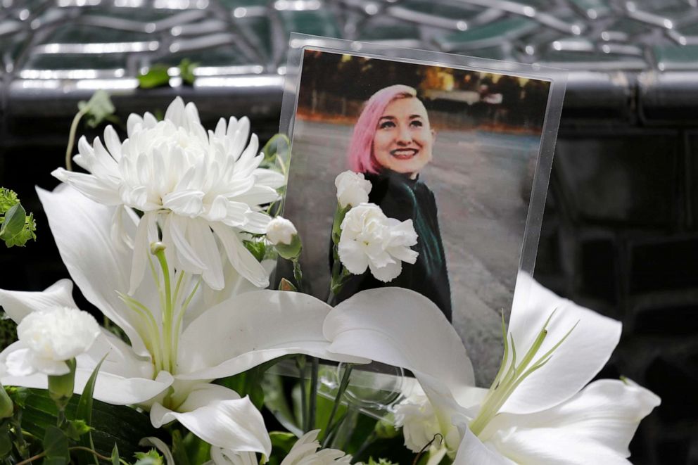 PHOTO: A photo of Summer Taylor, who died after being hit by a car while protesting on July 4, 2020, sits among flowers at the King County Correctional Facility where a hearing was held for the suspect, July 6, 2020, in Seattle. 