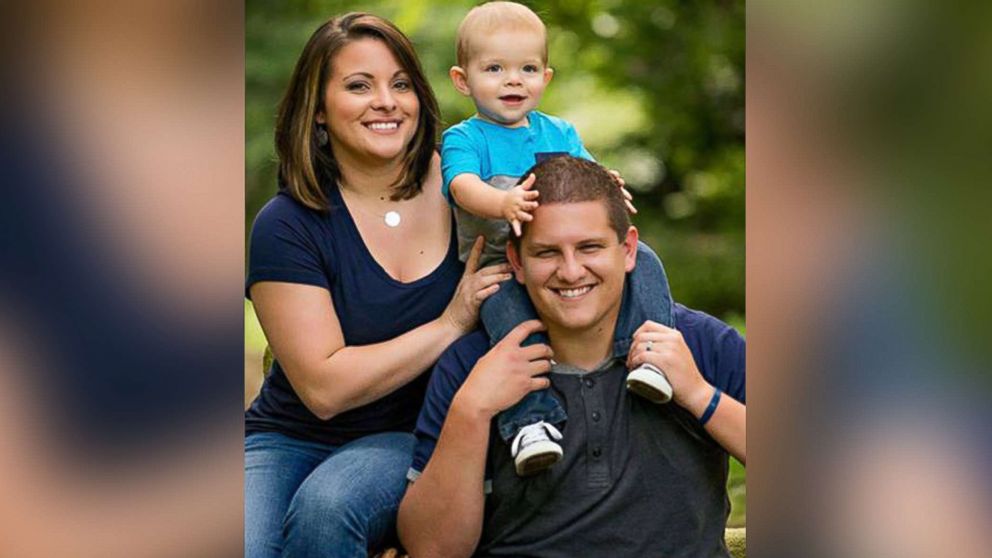 PHOTO: Undated family photo of Taylor Robertson posing with his wife, Holly, and their young son. Robertson was killed Sunday, Aug. 26, 2018, during a shooting at a video game tournament in Jacksonville, Fla.