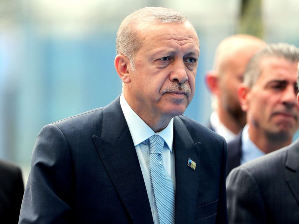 PHOTO: Turkish President Tayyip Erdogan arrives for the second day of a NATO summit in Brussels, July 12, 2018.