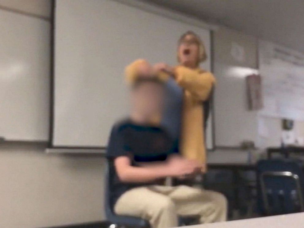  Teacher arrested after video shows her forcibly cutting 