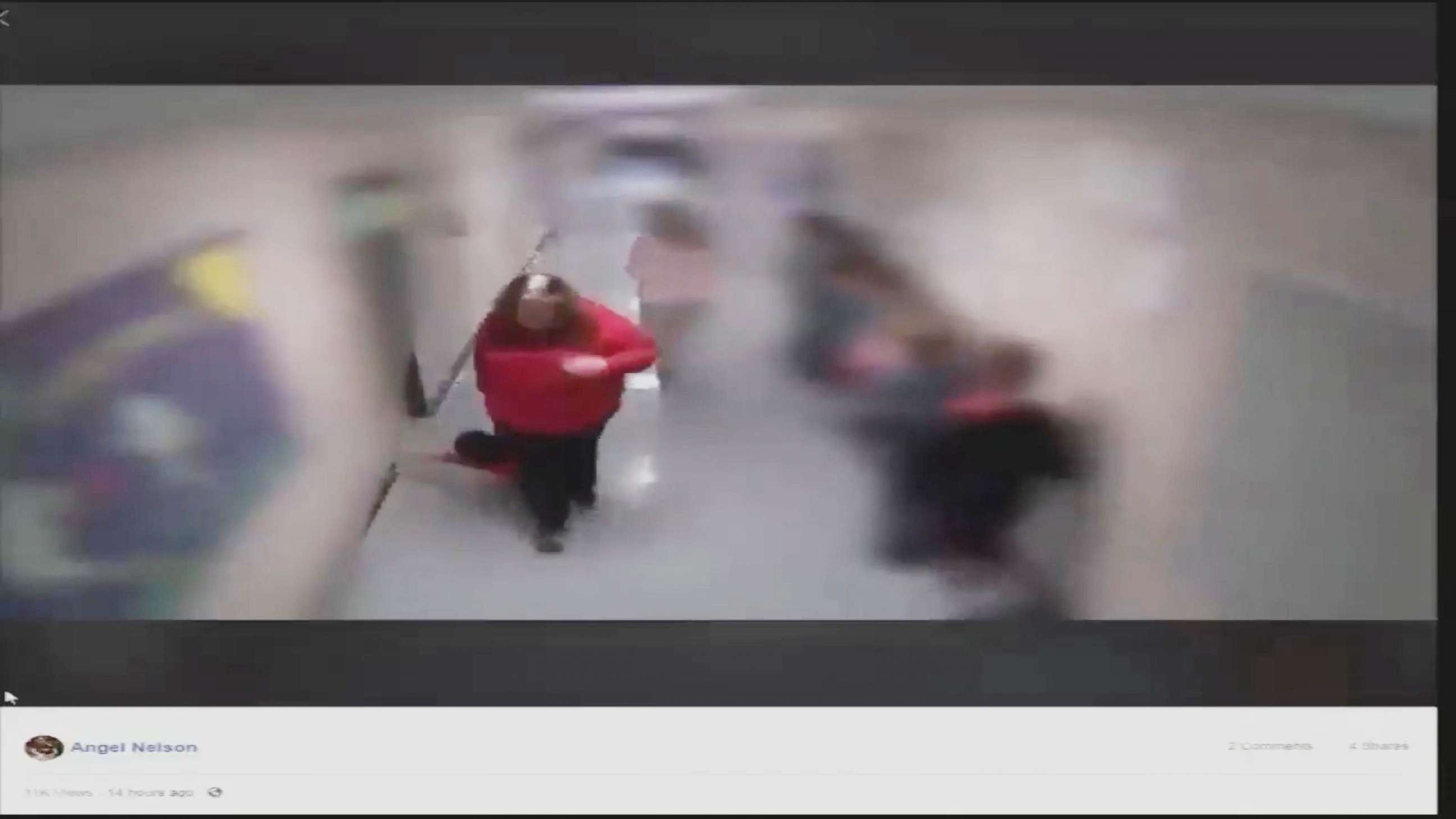 PHOTO: Surveillance video posted to Facebook by Angel Nelson shows her son Alan, 9, as he is dragged through the hall of Wurtland Elementary School in Greenup County, Ky., by a former teacher.