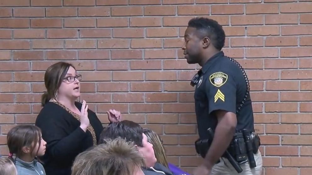 PHOTO: A video obtained by KATC shows teacher, Deyshia Hargrave, being handcuffed and removed from a school board meeting at Vermilion Parish in Louisiana.