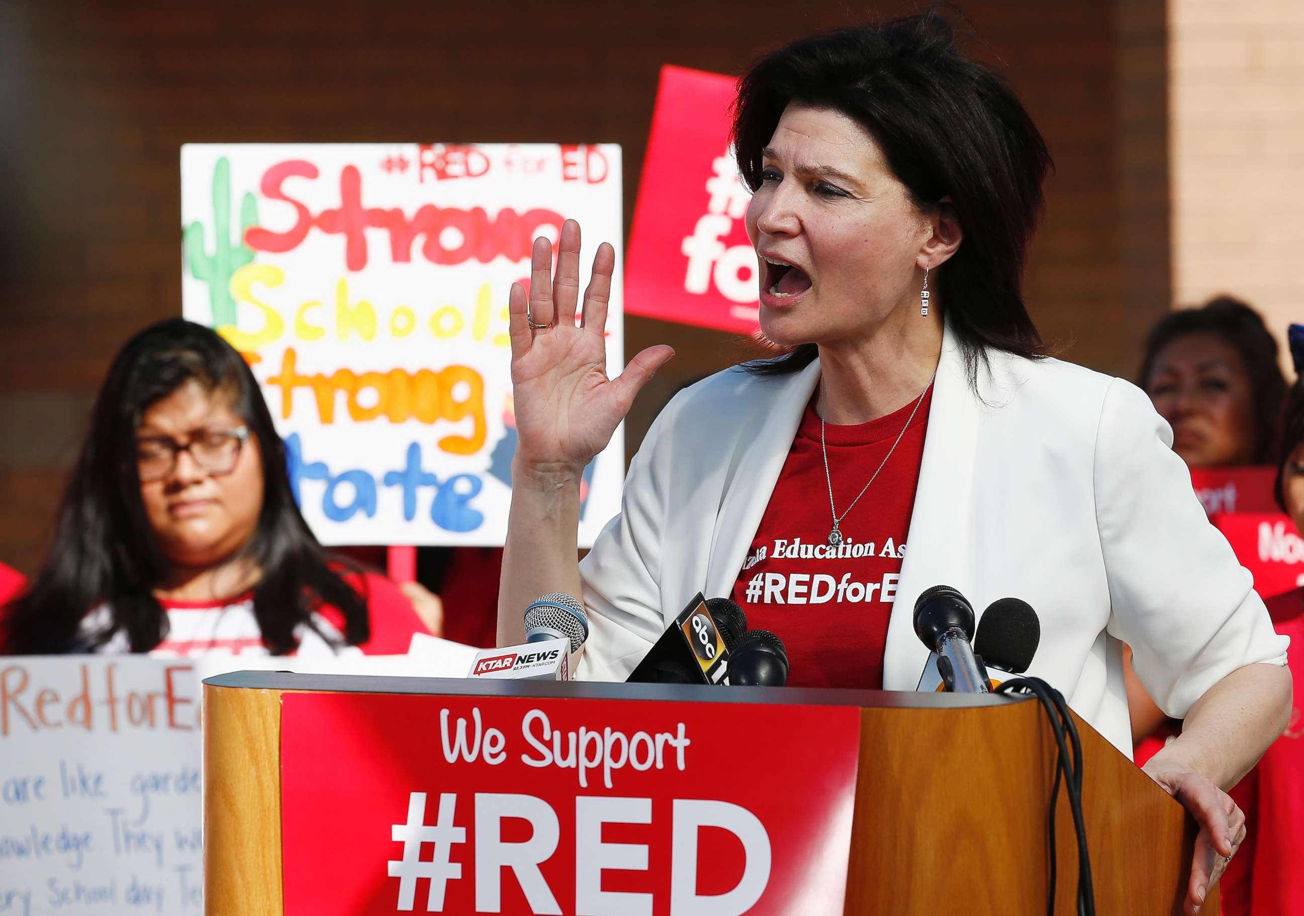 PHOTO: NEA President Lily Eskelsen Garcia speaks at the #RedForEd Walkout, March and Rally news conference regarding teacher pay and school funding Wednesday, April 25, 2018, in Phoenix.