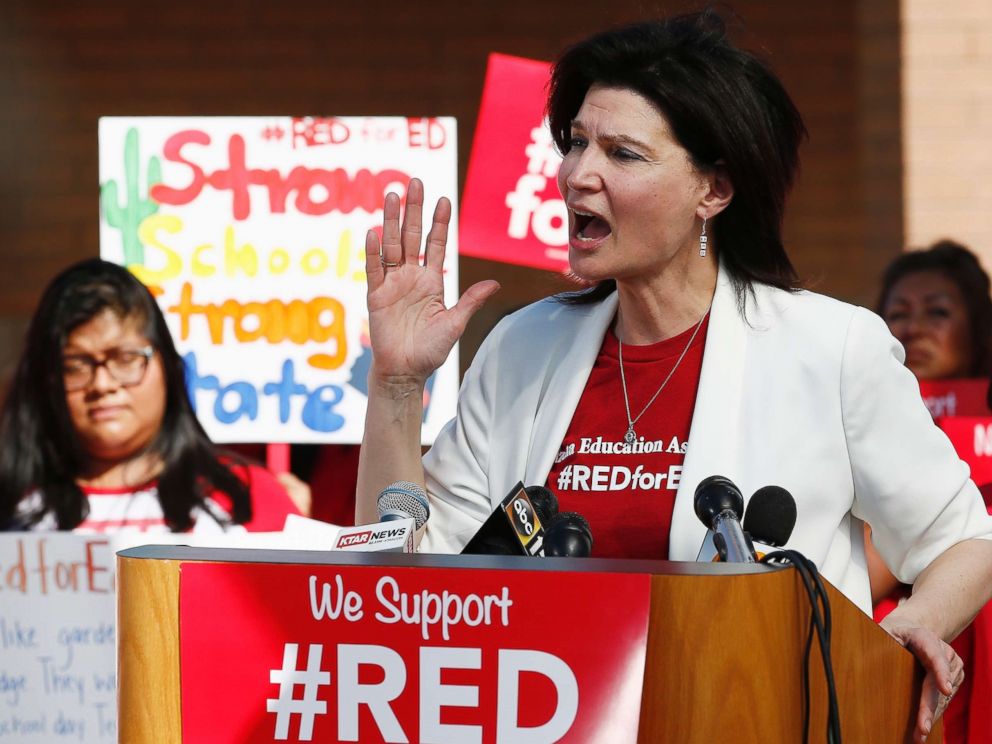 PHOTO: NEA President Lily Eskelsen Garcia speaks at the #RedForEd Walkout, March and Rally news conference regarding teacher pay and school funding Wednesday, April 25, 2018, in Phoenix.