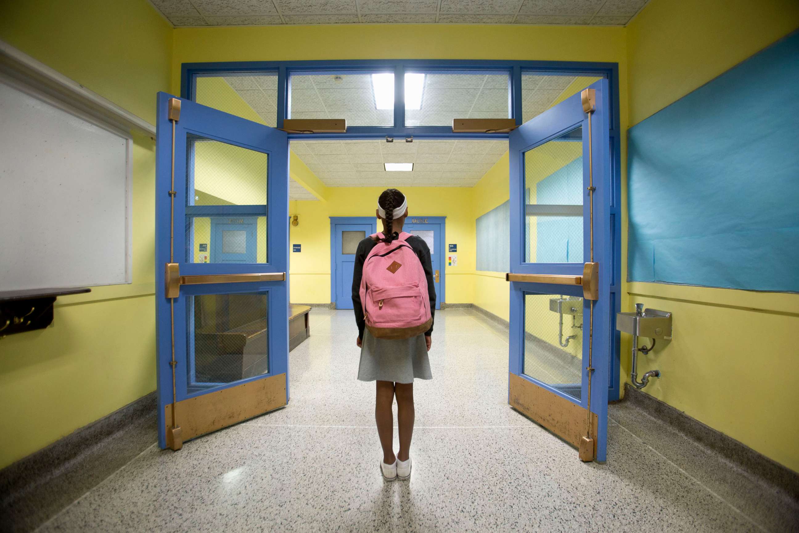 PHOTO: An eleven-year-old girl is pictured looking down school corridor in this undated stock image.