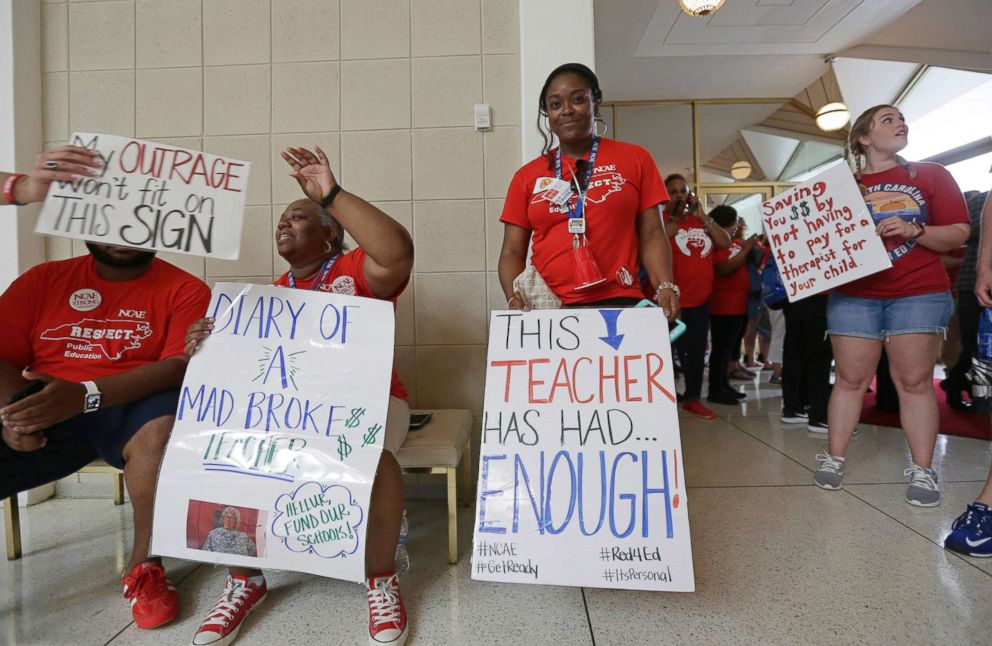PHOTO: Teachers gather outside the Senate and House chambers during a teachers rally at the General Assembly in Raleigh, N.C., on May 16, 2018.