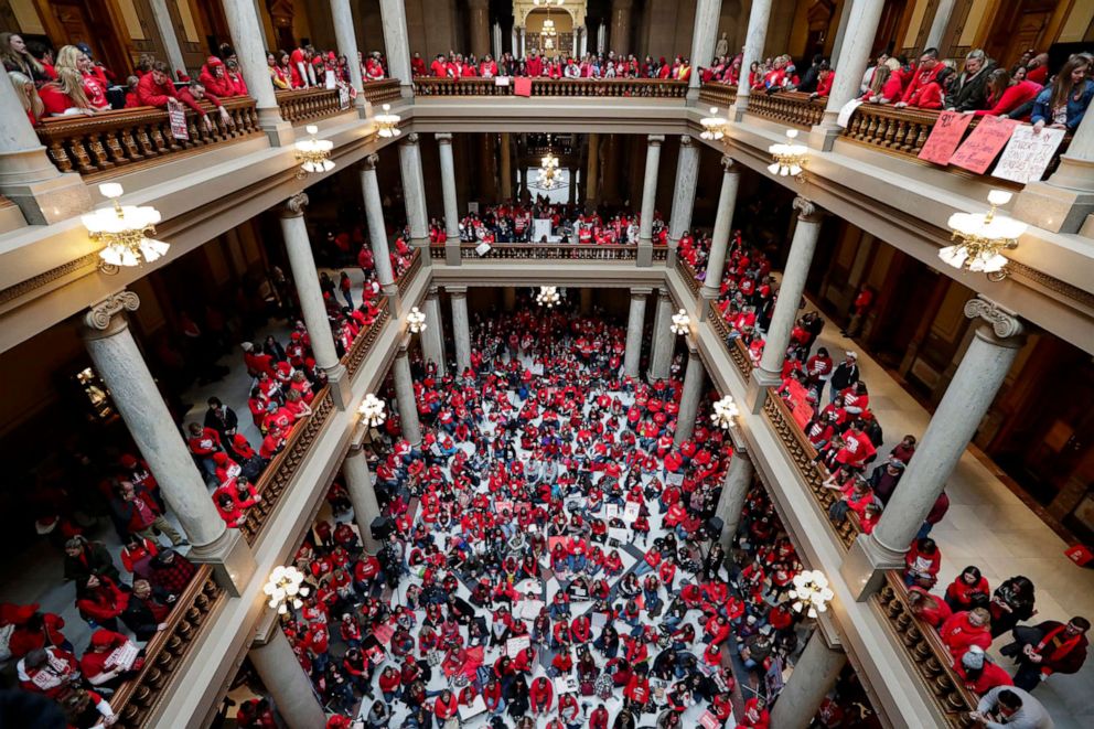 PHOTO: Thousands of Indiana teachers wearing red, hold rally at the Statehouse in Indianapolis, Nov. 19, 2019, calling for further increasing teacher pay in the biggest such protest in the state amid a wave of educator activism across the country.