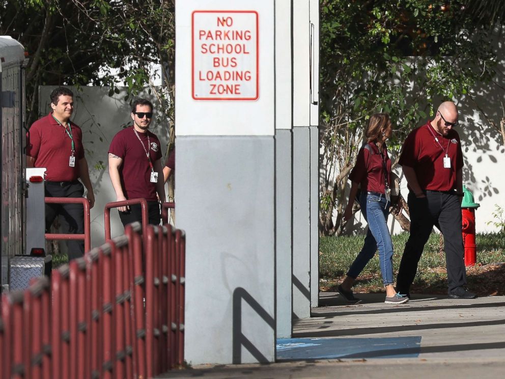 PHOTO: People arrive at Marjory Stoneman Douglas High School as teachers and staff are allowed to return to the school for the first time since the mass shooting on campus, Feb. 23, 2018 in Parkland, Florida. 