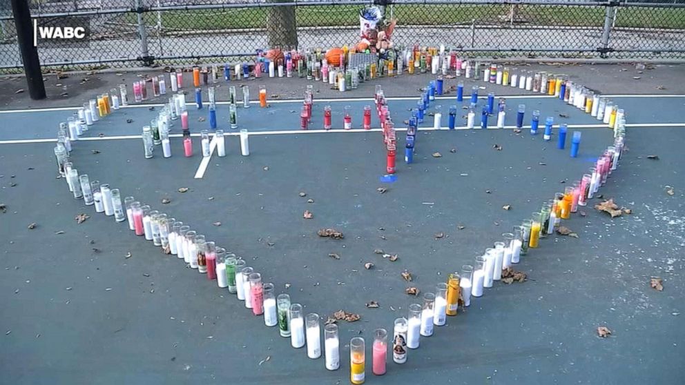 PHOTO: Candles are placed in the shape of a heart on a basketball court in Queens, New York, to honor a 14-year-old who was killed by a stray bullet on Saturday, Oct. 26.
