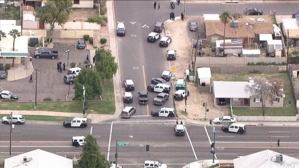 PHOTO: Police surround the area where an officer fatally shot 14-year-old Antonio Arce as he was allegedly burglarizing a car in Tempe, Ariz., on Tuesday, Jan. 15, 2019.