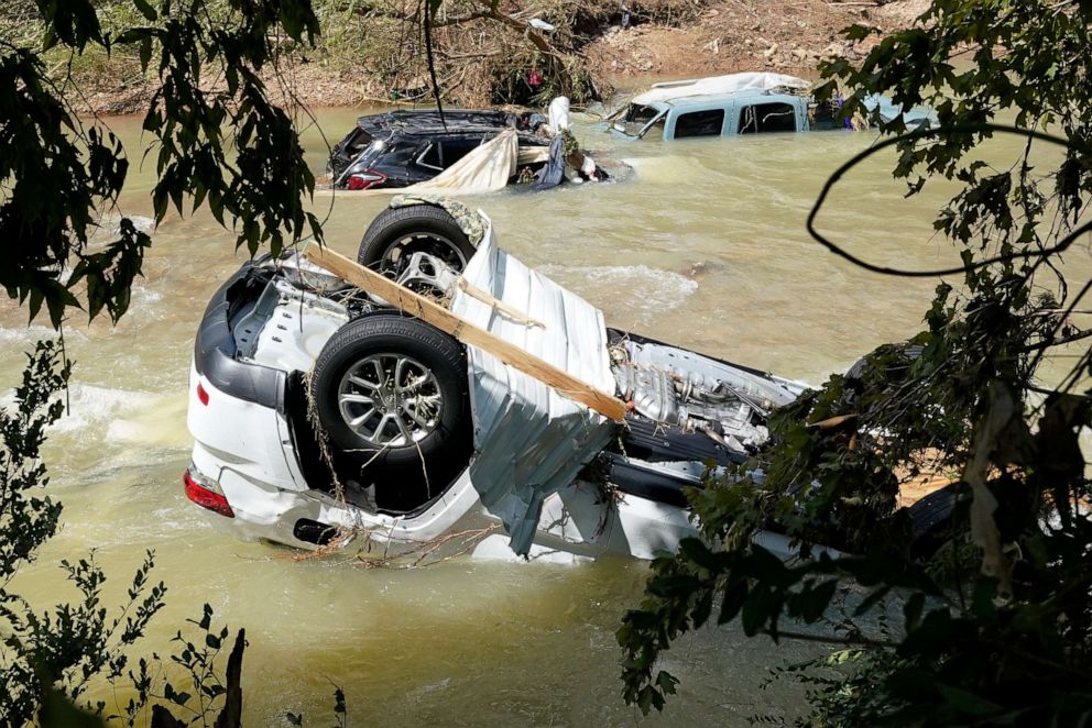 PHOTO: Vehicles in a stream, Aug. 22, 2021, in Waverly, Tenn.