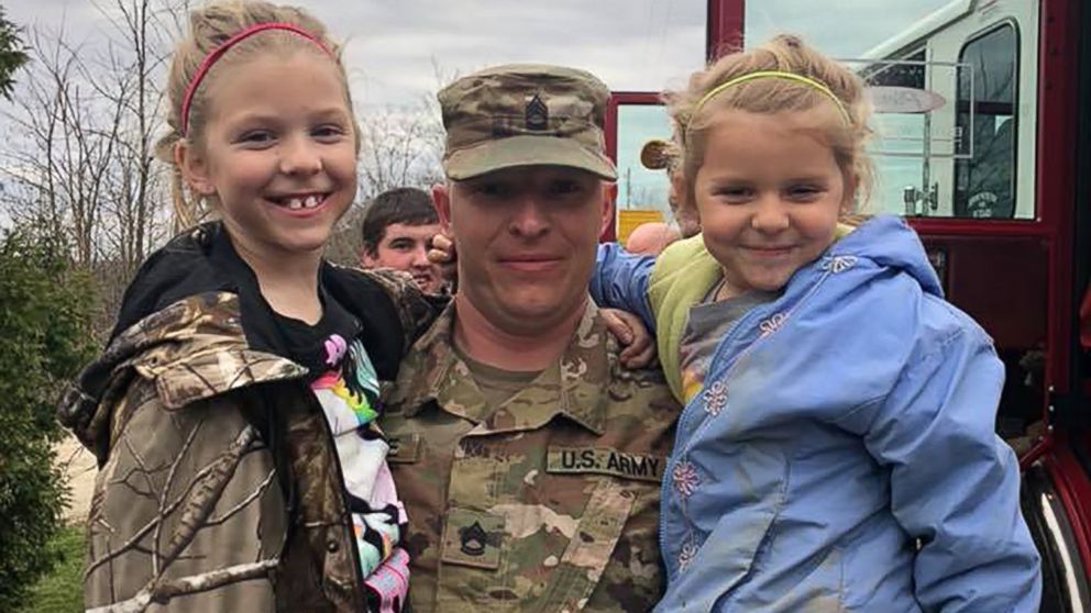 Soldier arrives home in a fire truck, surprising his daughters, after ...