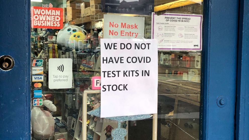 PHOTO: In this Dec. 29, 2021, file photo, a pharmacy in Queens, N.Y., has posted a sign on the door that they have run out of COVID-19 tests.