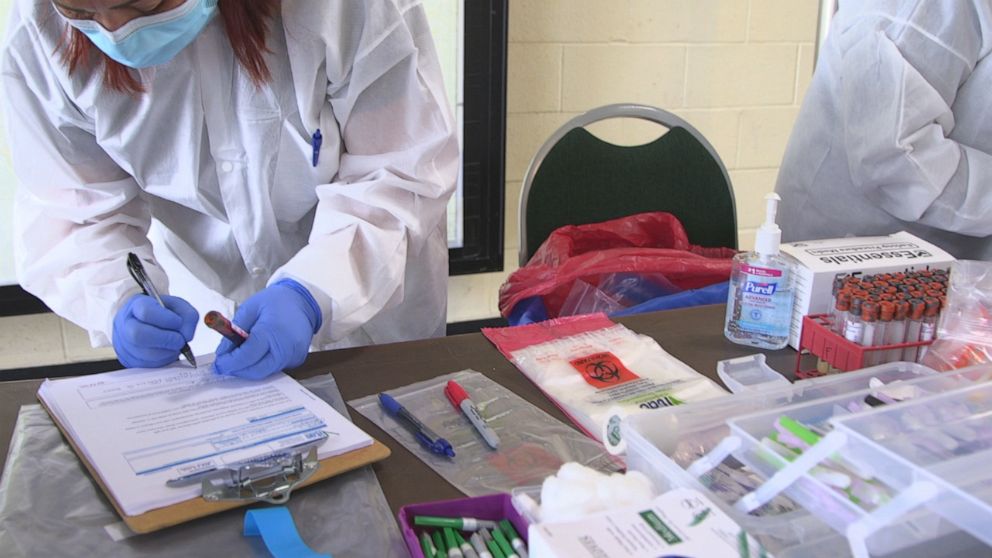 PHOTO: Tests are administered to Manhattan Beach, California, to first responders.