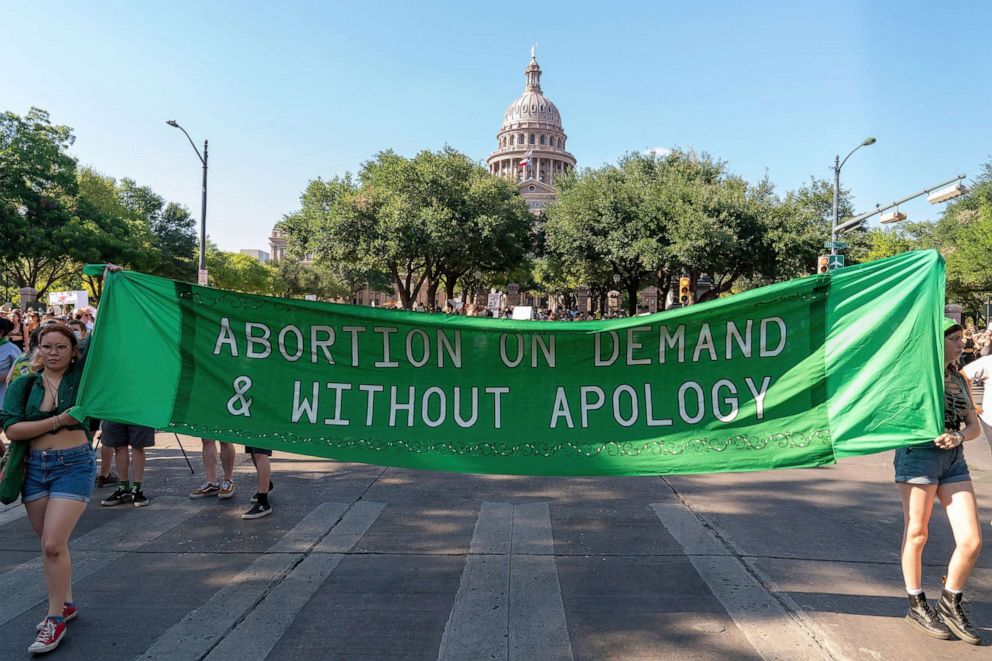 PHOTO: Abortion rights demonstrators march near the State Capitol in Austin, Texas, June 25, 2022. 