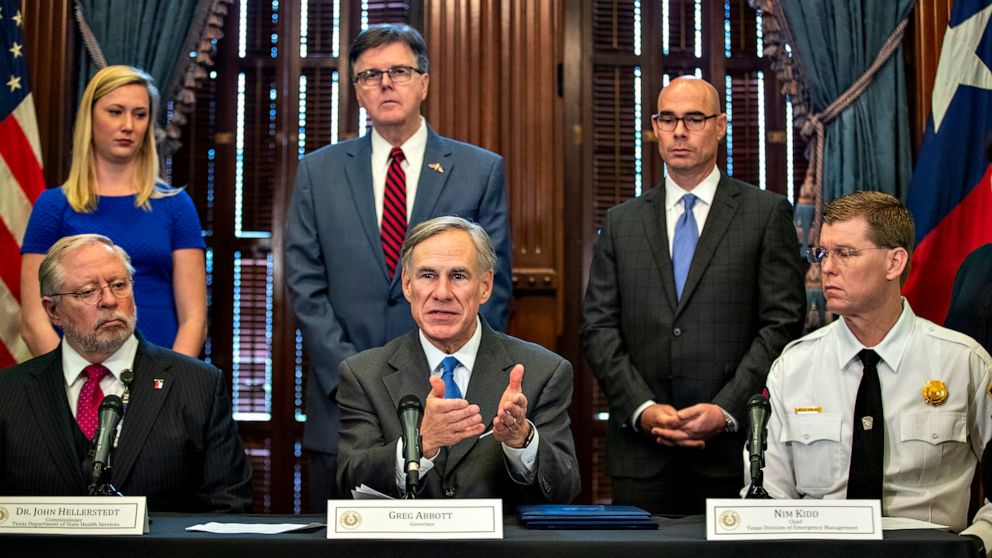 PHOTO: Texas Gov. Greg Abbott and top of officials announced new state policies to combat the coronavirus at the governor's office, March 19, 2020, in Austin.