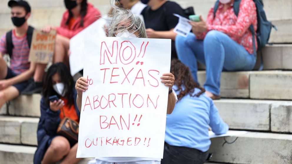 PHOTO: Debra Sweet holds up a sign as she joins people gathered for a reproductive rights rally at Brooklyn Borough Hall on Sept. 1, 2021, in New York City.